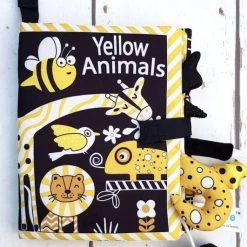 Merkloos MixG | Knisperboekje | Baby | Okergeel / Zwart / Wit | Engels/English